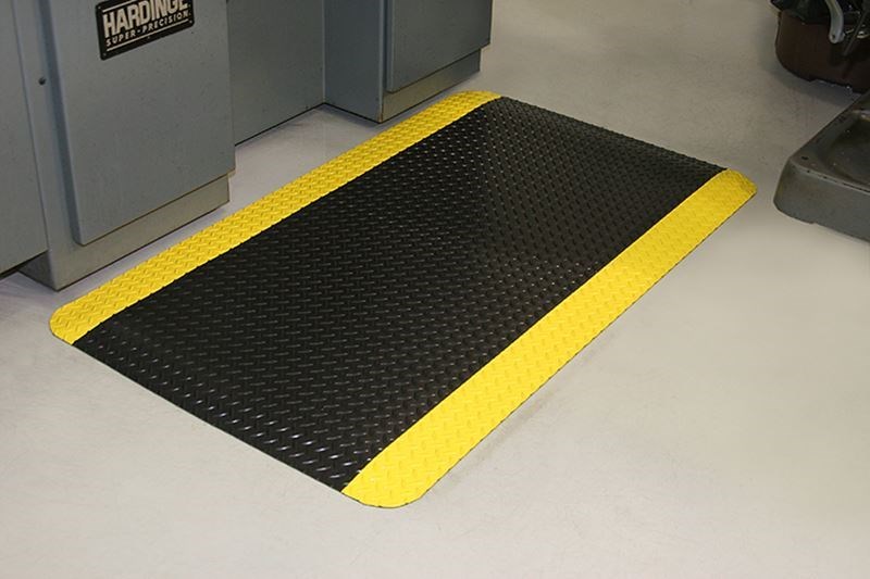Image of a diamond dek sponge floor mat for industrial spaces.