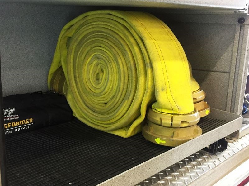 Image of Heromat, a self-draining compartment mat for fire trucks.