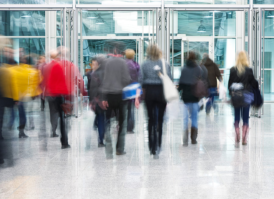 Image of people walking in busy area